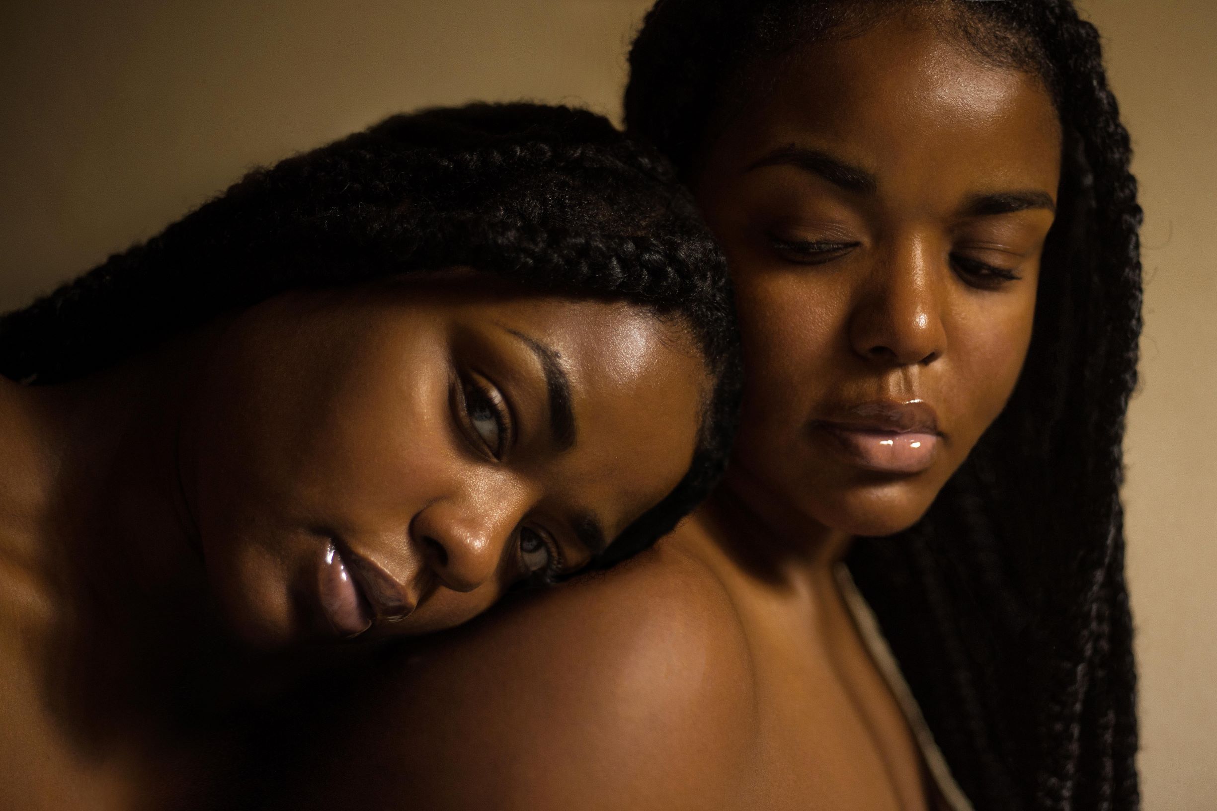 Two African American women embracing. Defeating powerlessness