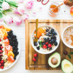 bowl of fruits, with avocado, and tea, smarter shopping to lose weight